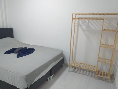 מיטה או מיטות בחדר ב-Melisa Apart