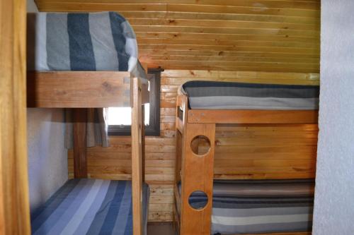 a couple of bunk beds in a cabin at Edificio Atenas in Malargüe