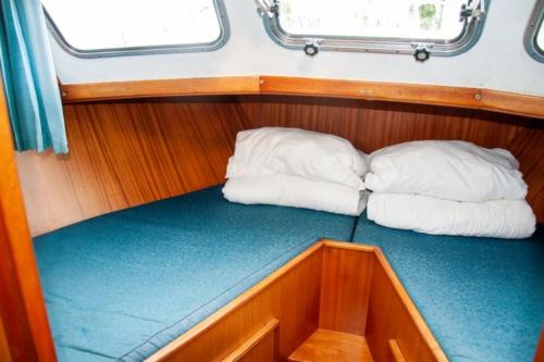 a boat with two pillows in the back of a boat at Motoryacht Albatros Proficiat 1120 GL in Buchholz