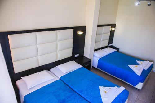 Posteľ alebo postele v izbe v ubytovaní Santa Rosa Hotel & Beach