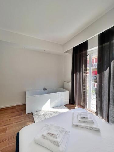 Ένα ή περισσότερα κρεβάτια σε δωμάτιο στο Finella Charming Rooms