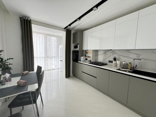 Kjøkken eller kjøkkenkrok på Квартира на Подолье