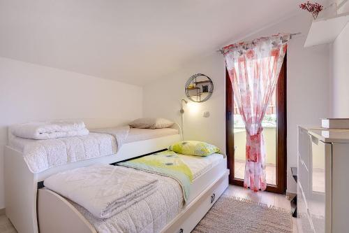 Ferienhaus mit Badminton- und Minifussballplatz