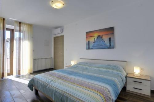 Posteľ alebo postele v izbe v ubytovaní Top Villa mit privatem Pool nur 1 km bis zum Strand mit Klima, WLAN, Sonnenliegen, Grill