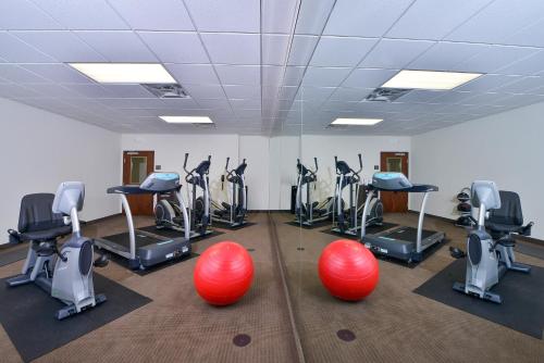 a gym with exercise balls and exercise bikes at Sleep Inn & Suites Austin – Tech Center in Austin