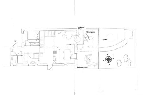 a floor plan of a house with a spider at Packhaus Norderney in Norderney