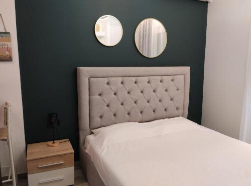 Postel nebo postele na pokoji v ubytování Petit Apartment - City Center - GORGOPOTAMOU 1