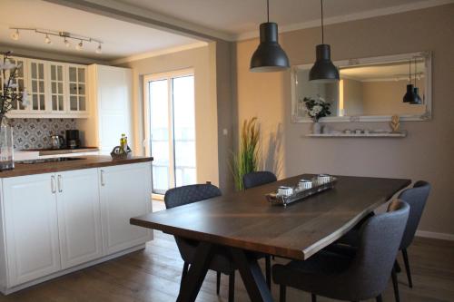 Kuchyň nebo kuchyňský kout v ubytování Wohnung EG im Einfachmeerferienhaus