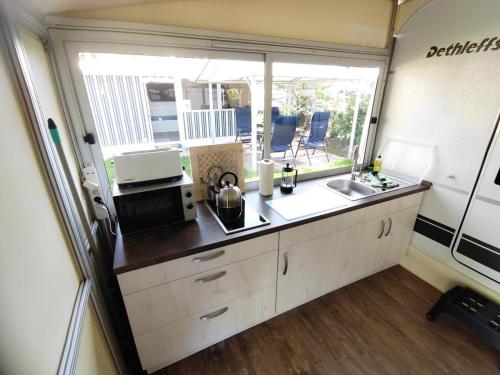 Una cocina o zona de cocina en Campingplatz Wusterhausen