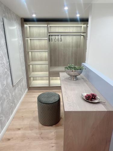 a room with a table and a bowl of roses at Zeus Design Loft Apartments Braunhirschen in Vienna