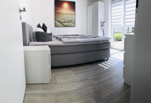 Un pat sau paturi într-o cameră la NEU! Ferienhaus live deluxe in der schönen Uckermark