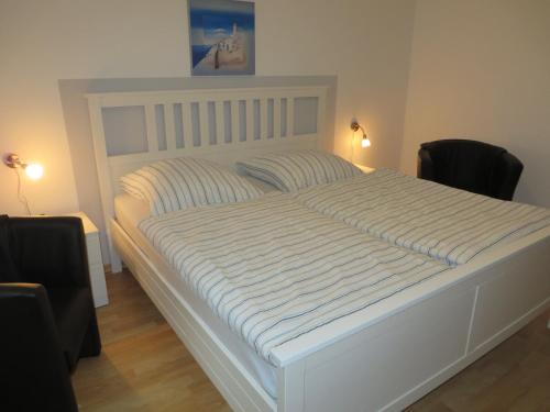 Postel nebo postele na pokoji v ubytování NEU! Ferienhof Freese-Schoone