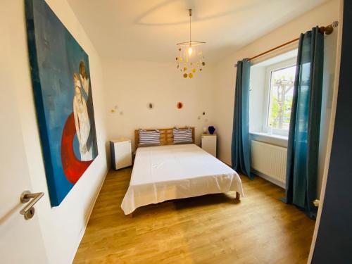 Postel nebo postele na pokoji v ubytování NEU! Ferienwohnung Atelier 7