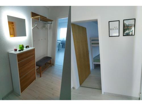 un corridoio con specchio e una stanza di NEU! Ferienwohnung Talblick a Hinterfalkau