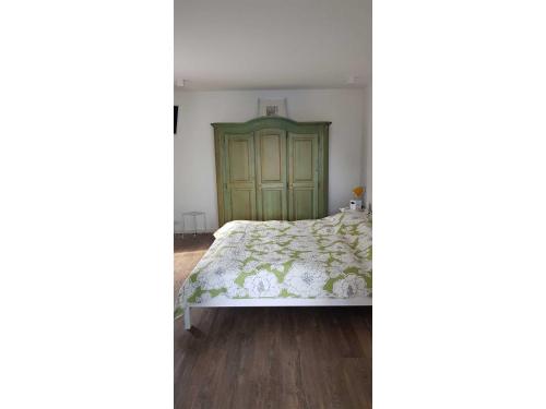 Postel nebo postele na pokoji v ubytování Ferienhaus Fahrrinne 44