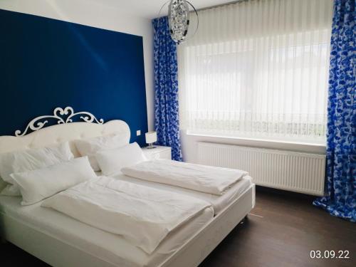 Postel nebo postele na pokoji v ubytování NEU! Ferienhaus zur alten Schlosserei mit Sauna