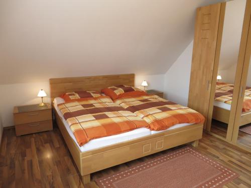 Postel nebo postele na pokoji v ubytování NEU Nordseeferienhaus An der Mühle