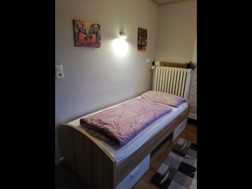 Postel nebo postele na pokoji v ubytování NEU! Ferienwohnung Alheimerblick