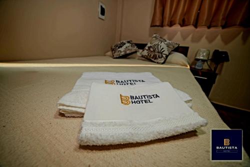 Krevet ili kreveti u jedinici u objektu BAUTISTA HOTEL