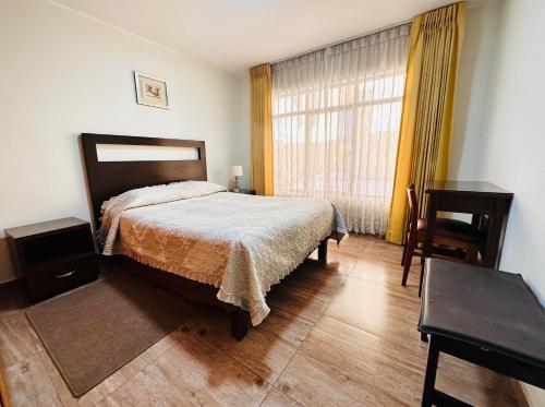 Postel nebo postele na pokoji v ubytování Arequipa Inn