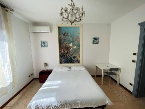 Ένα ή περισσότερα κρεβάτια σε δωμάτιο στο B&B LE AMARENE