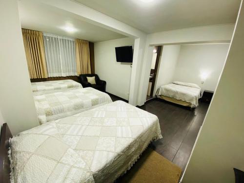 Postel nebo postele na pokoji v ubytování Arequipa Inn