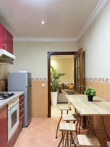 Kuchyň nebo kuchyňský kout v ubytování SUITOUISS - Agdal 1 - Appartement à 2 minutes de la gare de train TGV Rabat
