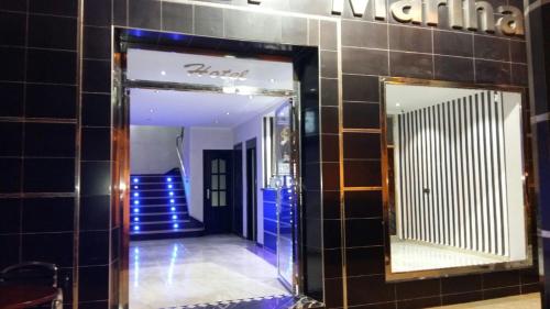 a mirror on the wall of a store at Hôtel Marina in Tetouan