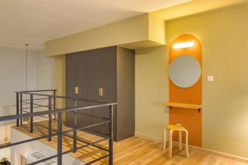 a room with a bunk bed and a mirror at Arte Cheras at Kuala Lumpur in Kuala Lumpur