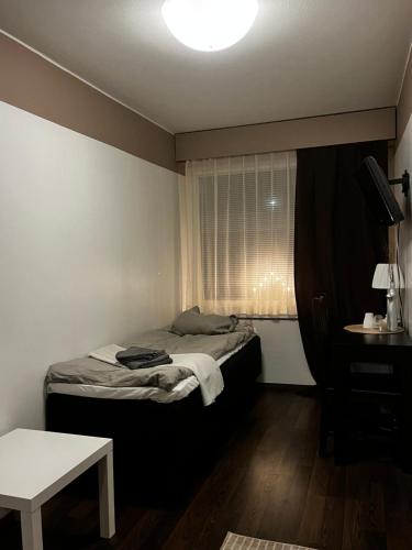 Postel nebo postele na pokoji v ubytování Hotelli Olla