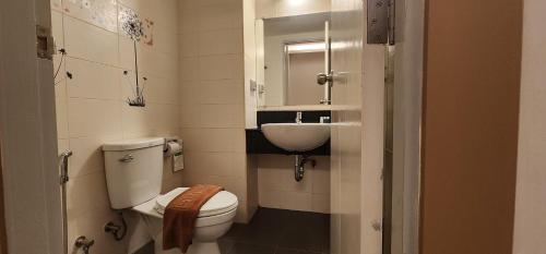 Koupelna v ubytování Prom Ratchada Hotel