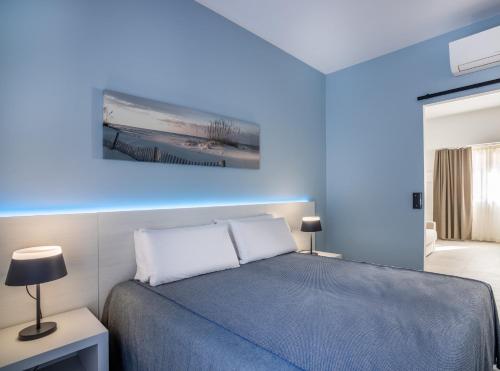 Postel nebo postele na pokoji v ubytování J Rooms