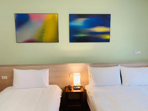 Ein Bett oder Betten in einem Zimmer der Unterkunft Ramble Travel Homestay