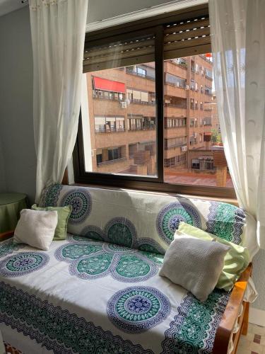 Ένα ή περισσότερα κρεβάτια σε δωμάτιο στο Apartamento centro