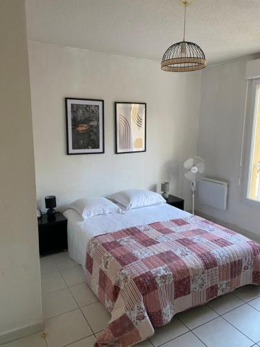 Krevet ili kreveti u jedinici u objektu Mondello Hotellerie&Consultant : Appartement de standing 47m2 avec piscine Cannes