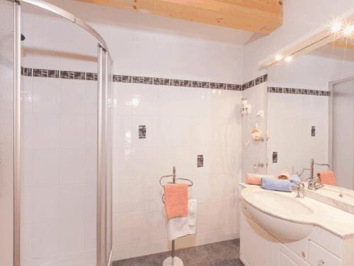 a bathroom with a shower and a sink at Ferienhaus2-Sölden in Sölden