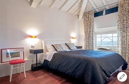 A bed or beds in a room at Amazing Sea View Flat