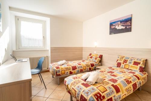 Llit o llits en una habitació de Appartamento 2 Cogolo centro- Val di Pejo