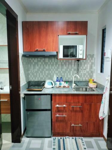 Una cocina o zona de cocina en Seaview Residence Garden Room1