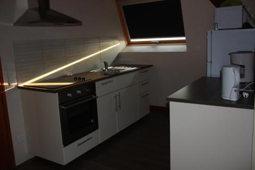 A kitchen or kitchenette at Chez Sabine et Laurent