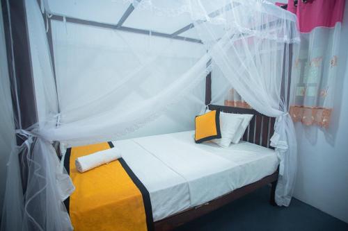 Ένα ή περισσότερα κρεβάτια σε δωμάτιο στο Meryvilla