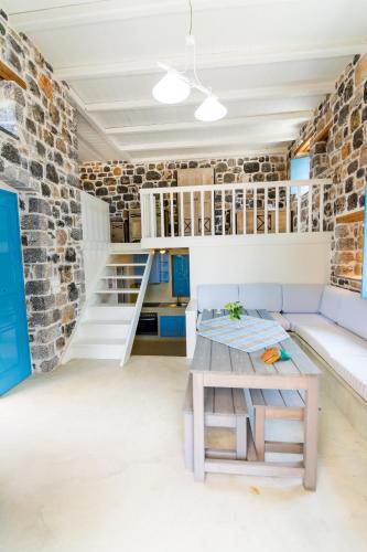 Ένα ή περισσότερα κρεβάτια σε δωμάτιο στο Pserimos Villas
