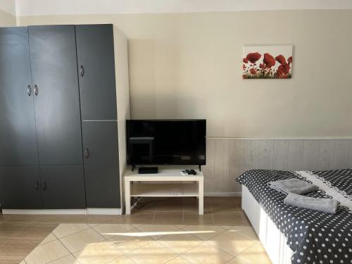 Postel nebo postele na pokoji v ubytování Idill Apartmanház B&B