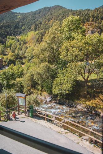 a view of a river from a bridge at Casa amb molt encant i tranquilitat. in Ansalonga
