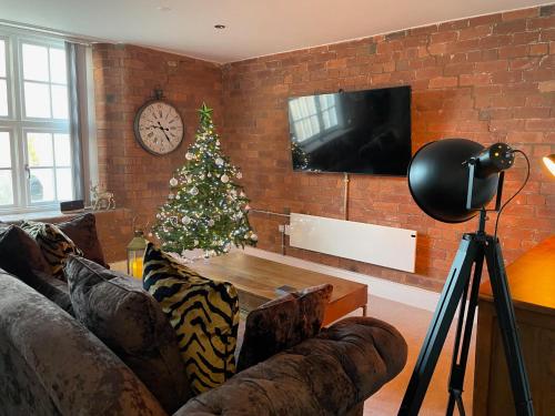 Staycation York at 62A Cocoa Suitesにあるテレビまたはエンターテインメントセンター