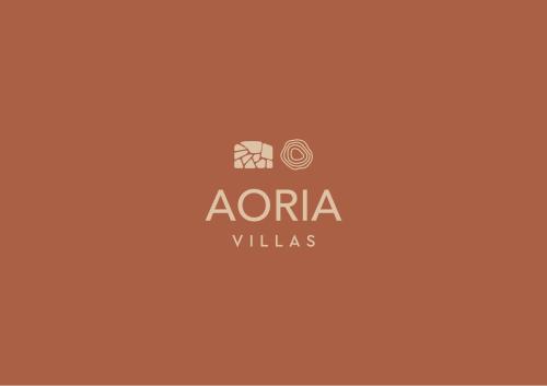 a logo for a villas with a picture of a camera at Aoria Villas in Palaiochóra