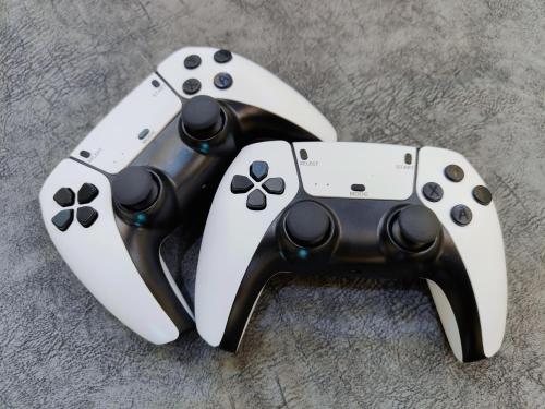 two video game controllers sitting next to each other at JPP Austin市区 3马力中央冷气 自动麻将机 游戏机 6分钟到 tebrau aeon toppen lotus in Johor Bahru