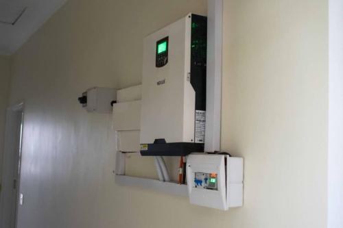 a machine in a room with a wall at Lynm Residence in Harare