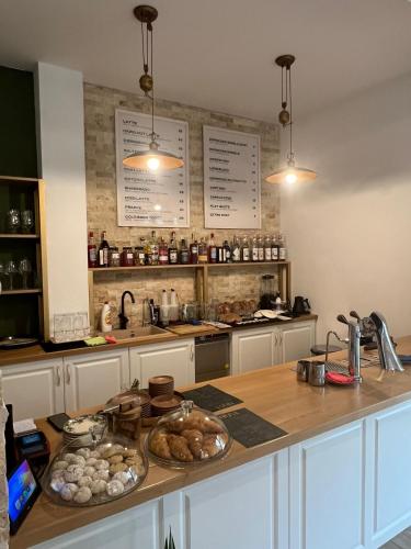 Kuchyň nebo kuchyňský kout v ubytování Apartament HERA