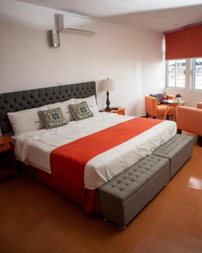 Cama o camas de una habitación en Hotel Atenas